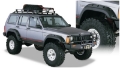 Picture of Bushwacker 84-01 Jeep Cherokee Cutout Style Flares 4pc Fits 4-Door Sport Utility Only - Black