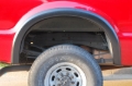 Picture of Lund 99-07 Ford F-250 SX-Sport Style Textured Elite Series Fender Flares - Black 2 Pc