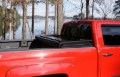 Picture of Lund 05-15 Toyota Tacoma Fleetside 6ft- Bed Hard Fold Tonneau Cover - Black