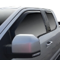 Picture of Westin 2015-2018 Ford F-150 SuperCab Wade In-Channel Wind Deflector 4pc - Smoke
