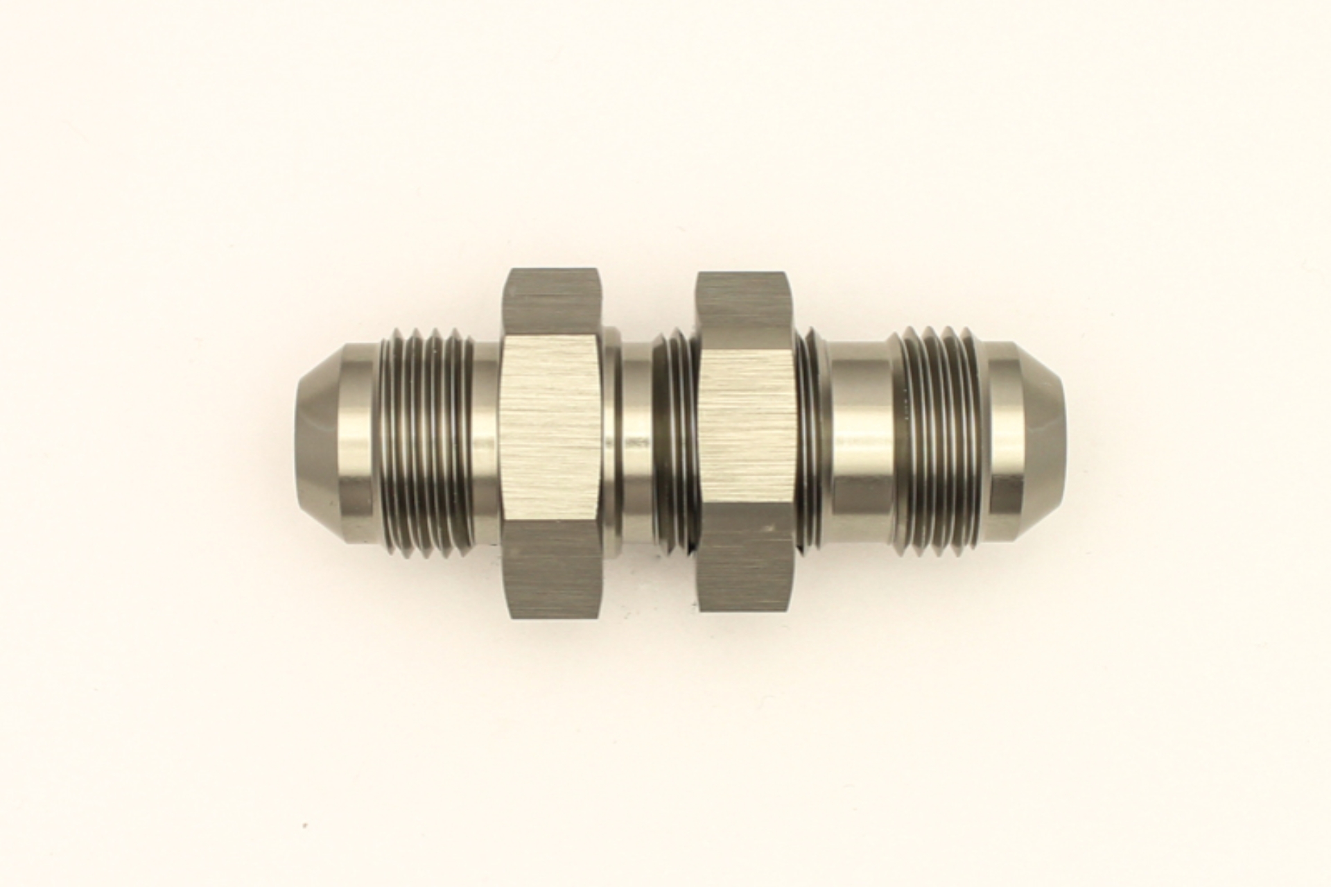 Picture of DeatschWerks 8AN Male Flare To 8AN Male Flare Bulkhead Adapter Incl- Nut