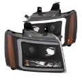 Picture of ANZO 07-14 Chevy Tahoe Projector Headlights w- Plank Style Design Black w- Amber