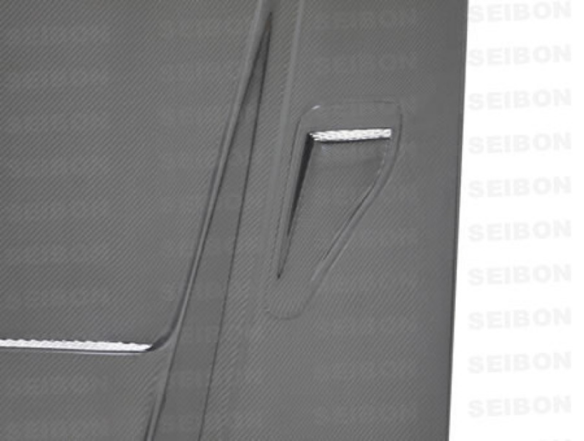 Picture of Seibon 90-94 Nissan Skyline R32 BNR32  DVII Carbon Fiber Hood