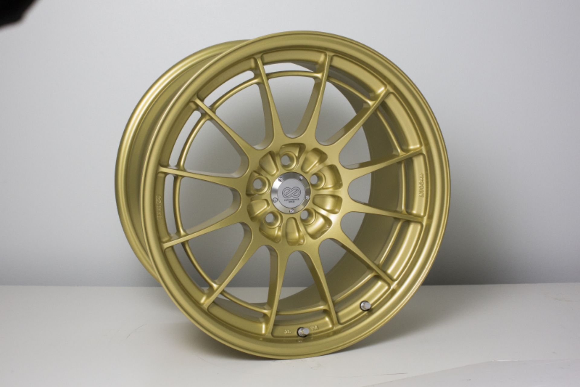 Picture of Enkei NT03+M 18x9-5 5x100 40mm Offset Gold Wheel MOQ 40 - Special Order