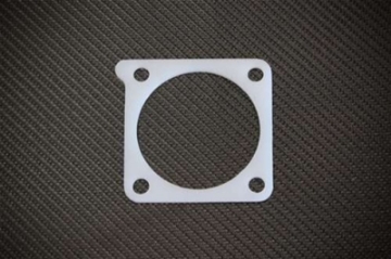 Picture of Torque Solution Thermal Throttle Body Gasket: Mitsubishi Eclipse 2-4L 2007-2011