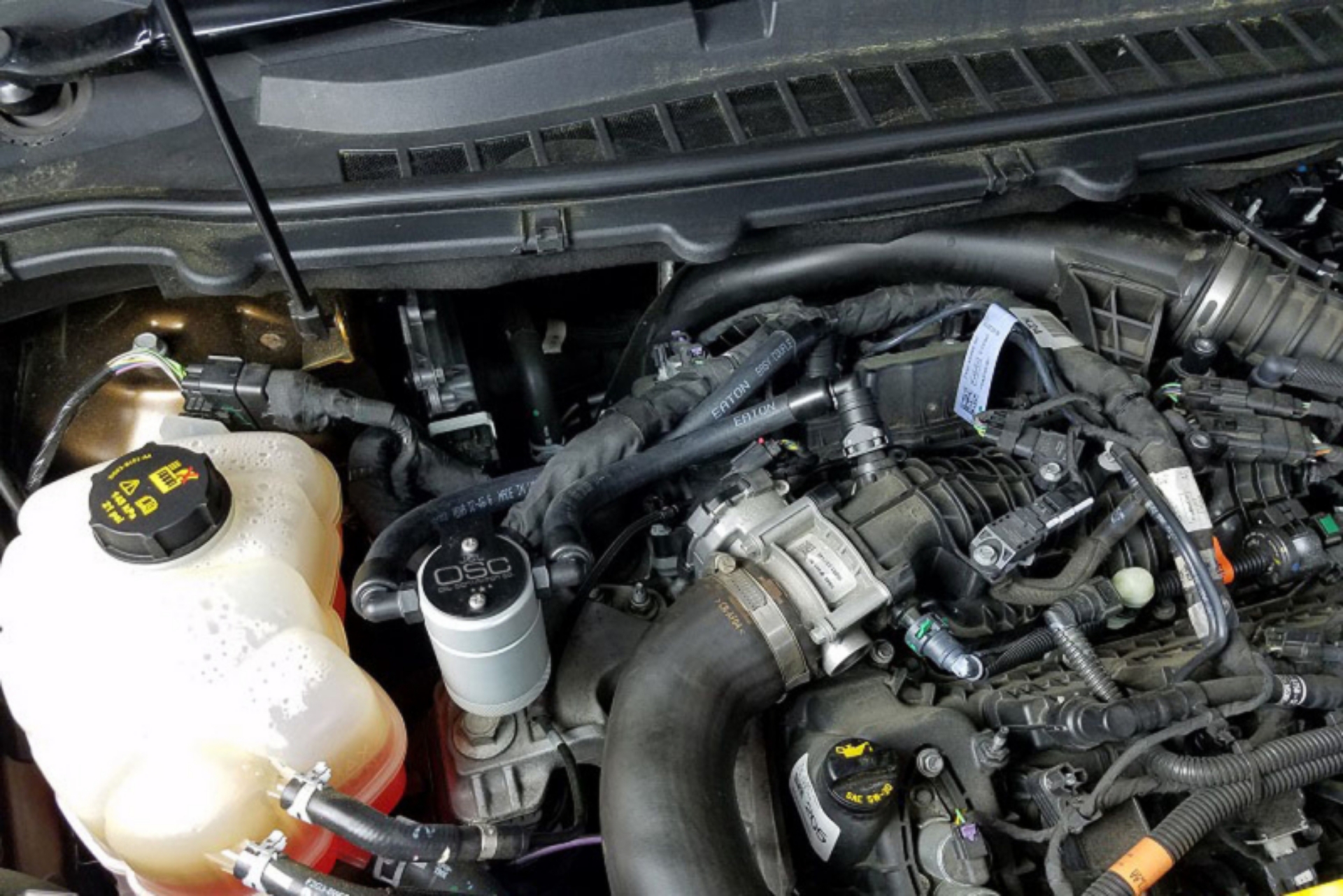 Picture of J&L 2015-2024 Ford Edge Sport-ST Passenger Side Oil Separator 3-0 - Clear Anodized