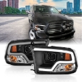 Picture of ANZO 09-18 Dodge Ram 1500 Plank Style Projector Headlights Black w- Halo