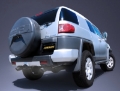Picture of Gibson 07-14 Toyota FJ Cruiser Base 4-0L 2-5in Cat-Back Dual Split Exhaust - Aluminized