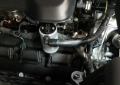 Picture of J&L 2019-2024 Dodge Ram 1500 5-7L Oil Separator 3-0 Passenger Side - Clear Anodized