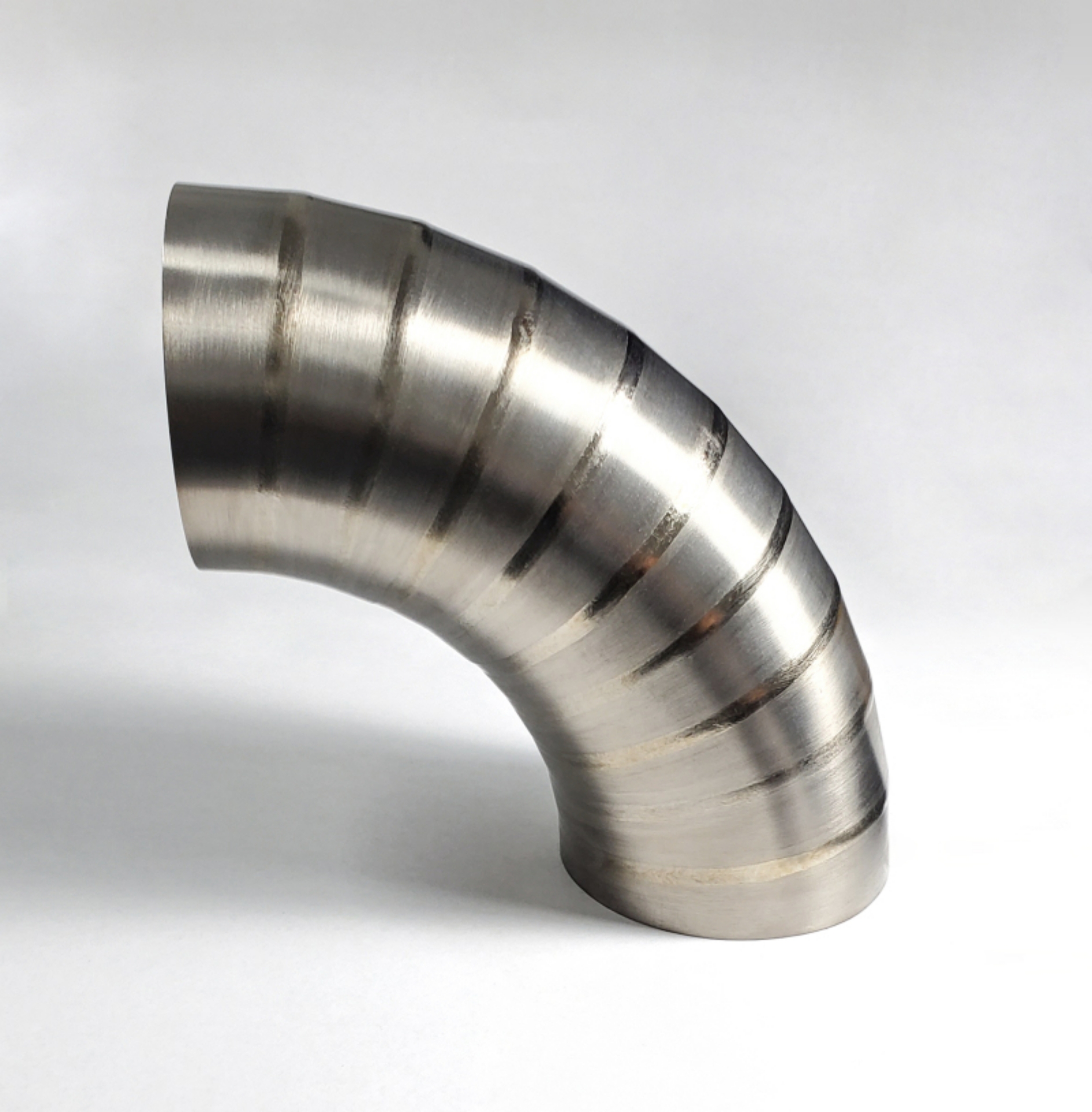 Picture of Ticon Industries 3-5in Welded Pie Cuts 1-65D Loose Radius 90 Deg Bend 1mm--039in- 10pk