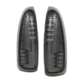 Picture of xTune Ford Superduty F250-F650 03-07 Amber LED Mirror Signal Lens - Smoke ACC-LED-FDSD99-MR-SM