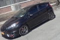 Picture of Rally Armor 13-19 Ford Fiesta ST Red UR Mud Flap w-White Logo