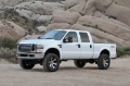 Picture of Fabtech 08-16 Ford F250-350-450 4WD 8 Lug 4in Budget Sys w-Perf Shks