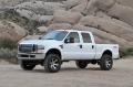 Picture of Fabtech 08-16 Ford F250-350-450 4WD 8 Lug 4in Budget Sys w-Stealth