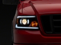 Picture of Raxiom 04-08 Ford F-150 Axial Series Projector Headlights w- SEQL LED Bar- Blk Housing Clear Lens