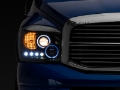 Picture of Raxiom 06-08 Dodge RAM 1500 LED Halo Projector Headlights- Blk Housing Clear Lens