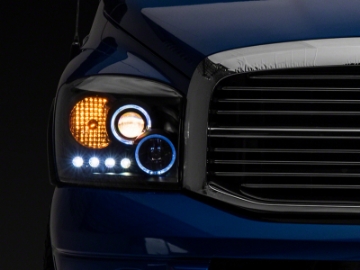 Picture of Raxiom 06-08 Dodge RAM 1500 LED Halo Projector Headlights- Blk Housing Clear Lens