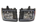 Picture of Raxiom 07-13 GMC Sierra 1500 Axial Series Headlights w- LED Bar- Blk Housing Clear Lens