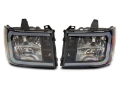 Picture of Raxiom 07-13 GMC Sierra 1500 Axial Series Headlights w- LED Bar- Blk Housing Clear Lens