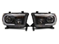 Picture of Raxiom 07-13 Toyota Tundra Axial Projector Headlights w- SEQL LED Bar- Blk Housing Clear Lens
