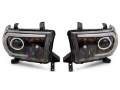 Picture of Raxiom 07-13 Toyota Tundra Axial Series Projector Headlights w- LED Bar- Blk Housing Clear Lens