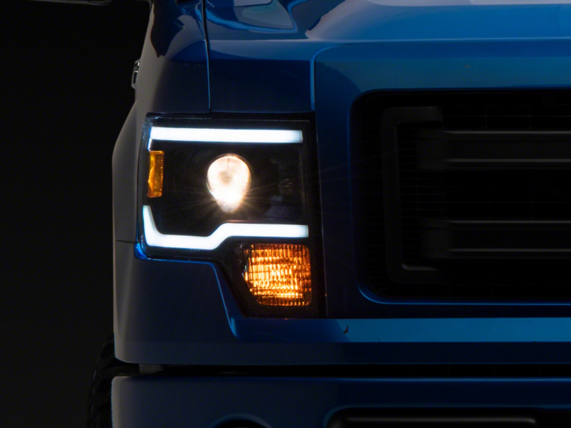 Picture of Raxiom 09-14 Ford F-150 Axial Series Projector Headlights w- LED Light Bar- Blk Housing Clear Lens