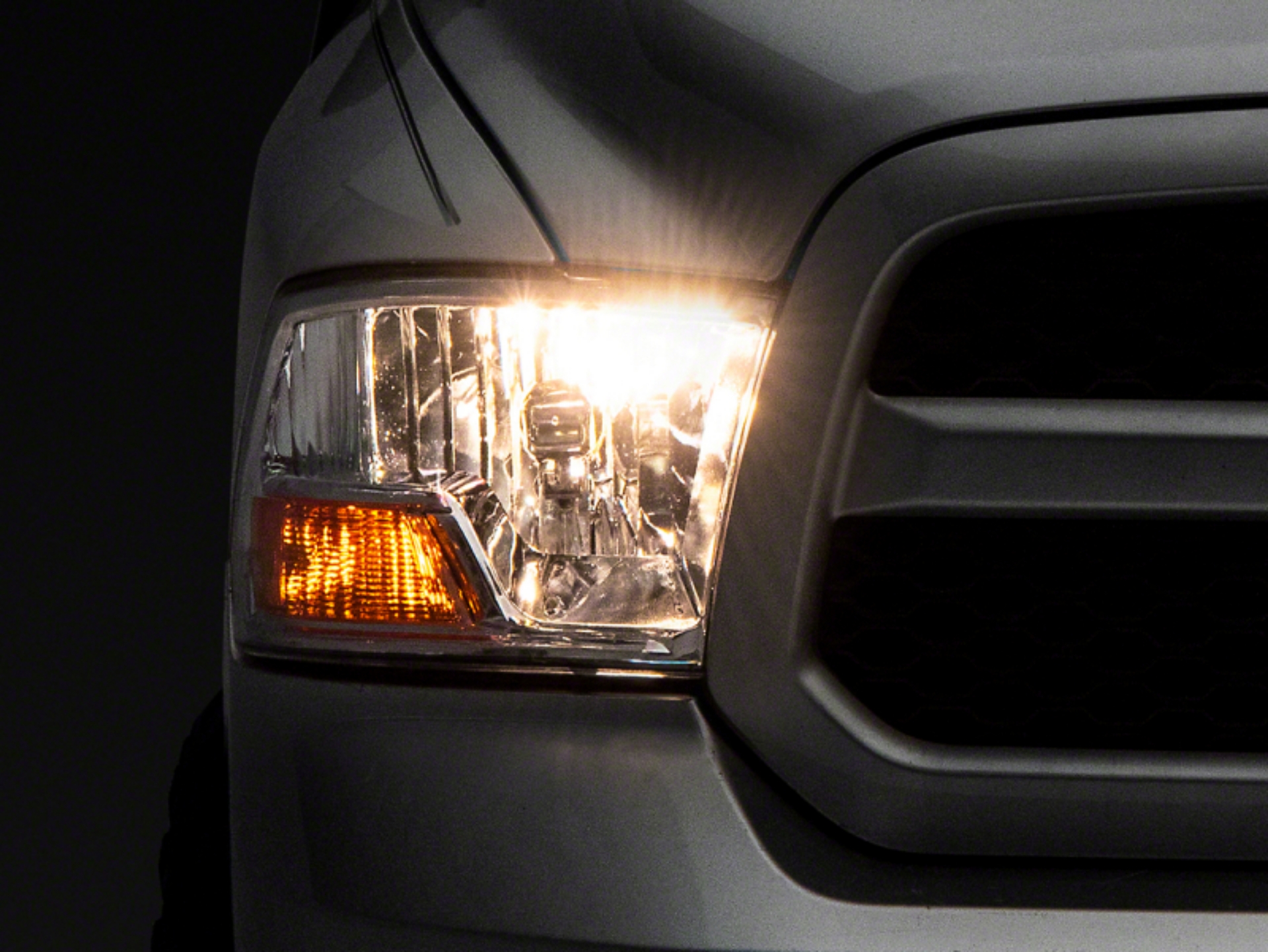 Picture of Raxiom 09-18 Dodge RAM 1500 Axial OEM Rep Headlights w- Single Bulb- Chrome Housing Clear Lens