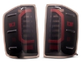 Picture of Raxiom 14-18 Chevrolet Silverado 1500 Axial Series LED Tail Lights- Blk Housing Smoked Lens