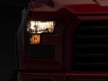 Picture of Raxiom 15-17 Ford F-150 Axial OEM Style Rep Headlights- Chrome Housing- Smoked Lens