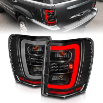 Picture of ANZO 1999-2004 Jeep Grand Cherokee LED Tail Lights w- Light Bar Black Housing Clear Lens