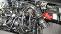 Picture of J&L 19-24 Ford-Lincoln SUV & Trucks w 2-0 EcoBoost Driver Side Oil Separator 3-0 - Black Ano