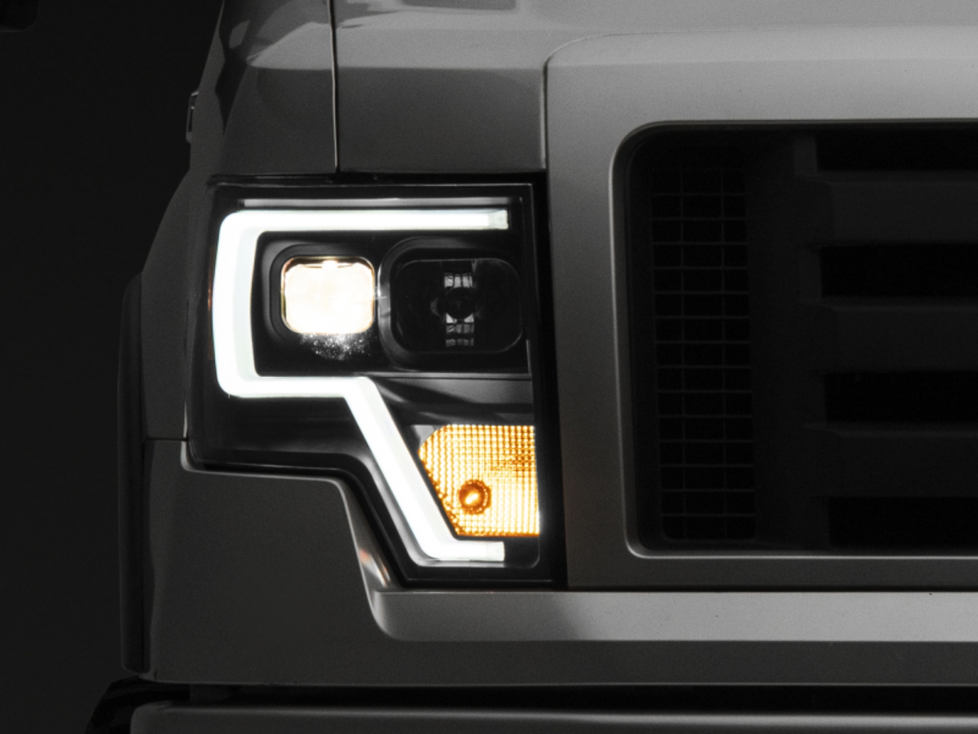 Picture of Raxiom 09-14 F-150 Projector Headlights w- LED Accent- Black Housing Clear Lens