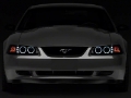 Picture of Raxiom 99-04 Ford Mustang Dual LED Halo Projector Headlights- Black Housing Smoked Lens