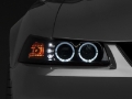 Picture of Raxiom 99-04 Ford Mustang Dual LED Halo Projector Headlights- Black Housing Smoked Lens