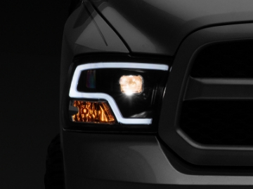 Picture of Raxiom 09-18 RAM 1500 LED Halo Projector Headlights- Black Housing Clear Lens