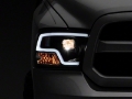Picture of Raxiom 09-18 RAM 1500 LED Halo Projector Headlights- Black Housing Clear Lens