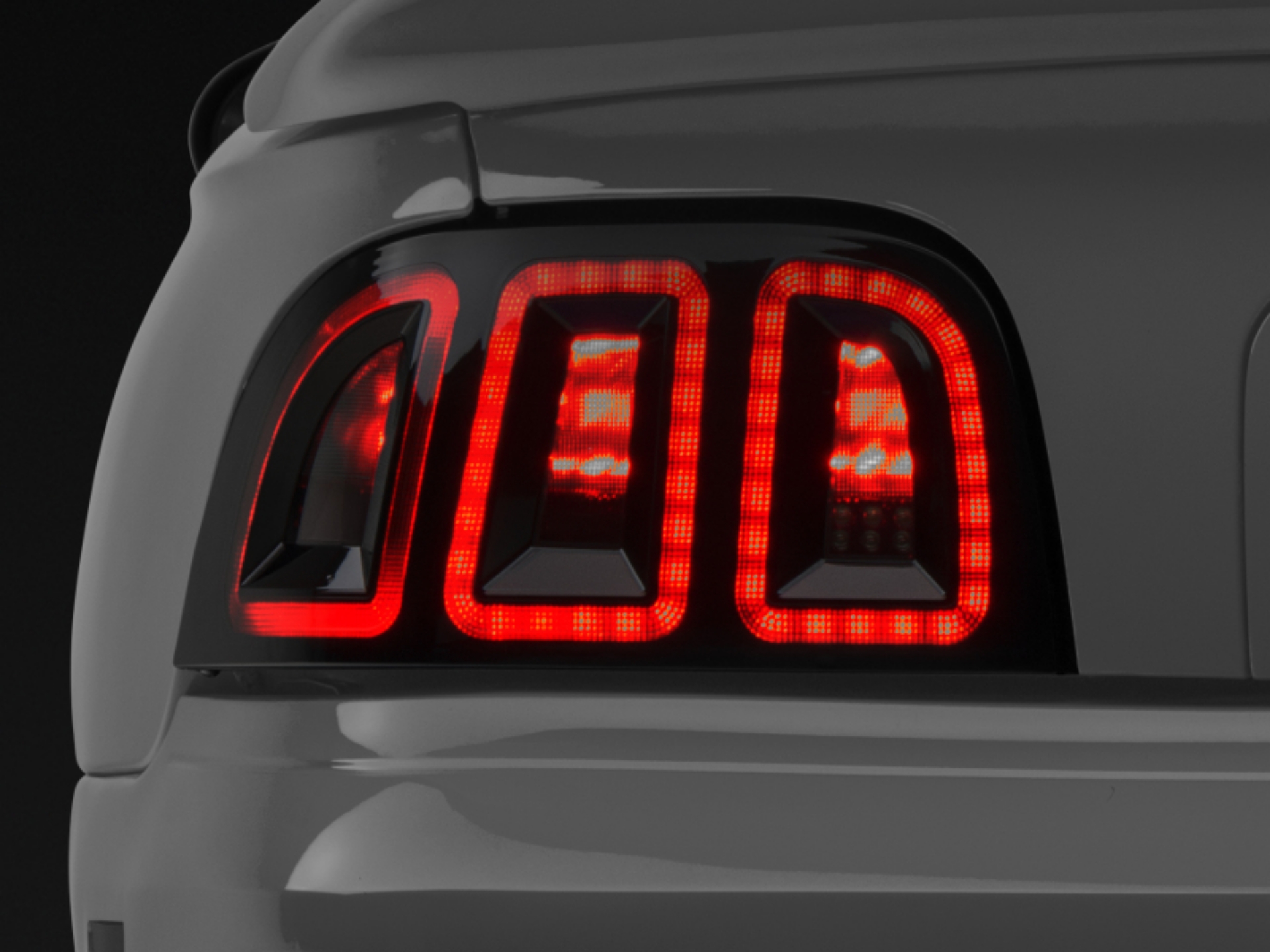 Picture of Raxiom 96-98 Ford Mustang Icon LED Tail Lights- Black Housing Smoked Lens
