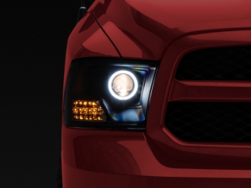 Picture of Raxiom 09-18 RAM 1500 Super White LED Halo Projector Headlights- Black Housing Clear Lens