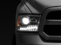 Picture of Raxiom 09-18 Dodge RAM 1500 LED Halo Headlights w- Swtchbck Turn Signals- Chrome Hsng Clear Lens