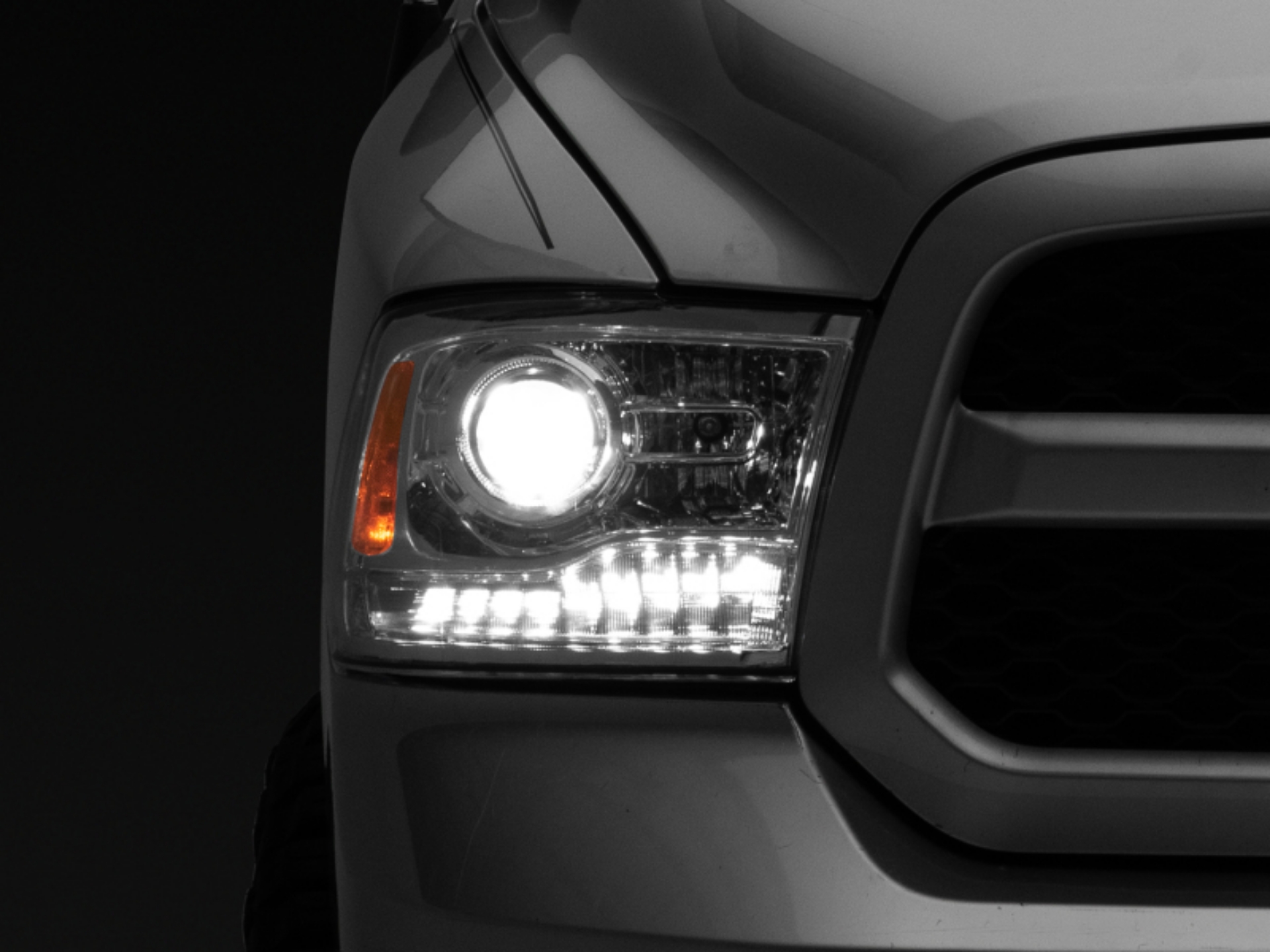 Picture of Raxiom 09-18 Dodge RAM 1500 LED Halo Headlights w- Swtchbck Turn Signals- Chrome Hsng Clear Lens