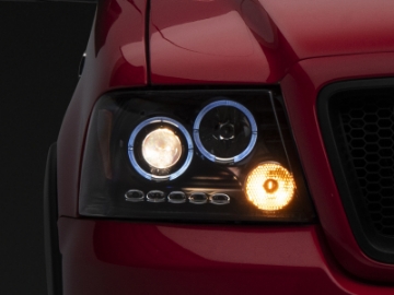 Picture of Raxiom 04-08 Ford F-150 Dual LED Halo Projector Headlights- Black Housing Clear Lens