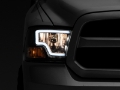 Picture of Raxiom 09-18 Dodge RAM 1500 LED Bar Headlights- Black Housing Clear Lens