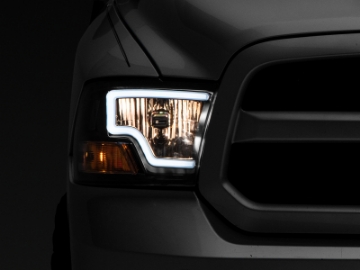Picture of Raxiom 09-18 Dodge RAM 1500 LED Bar Headlights- Black Housing Clear Lens