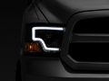 Picture of Raxiom 09-18 Dodge RAM 1500 LED Bar Headlights- Black Housing Clear Lens